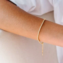 LOVE TENNIS BRACELET - CUBIC ZIRCONIA & GOLD 6.5 - 7.5"