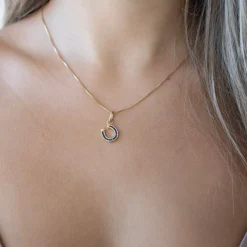 LOYAL CRYSTAL HORSESHOE CHARM - BLUE CUBIC ZIRCONIA