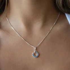 LOYAL CRYSTAL HORSESHOE CHARM - BLUE CUBIC ZIRCONIA