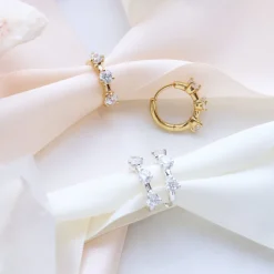 SCATTERED LOVE HUGGIE HOOPS - CUBIC ZIRCONIA & SILVER