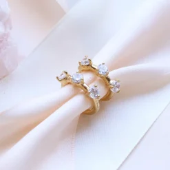 SCATTERED LOVE HUGGIE HOOPS - CUBIC ZIRCONIA & GOLD