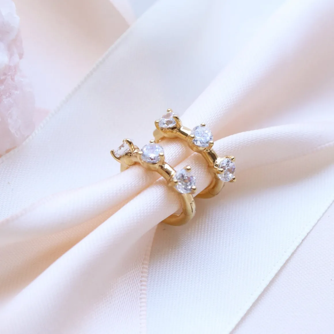 SCATTERED LOVE HUGGIE HOOPS - CUBIC ZIRCONIA & GOLD