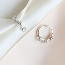 SCATTERED LOVE HUGGIE HOOPS - CUBIC ZIRCONIA & SILVER