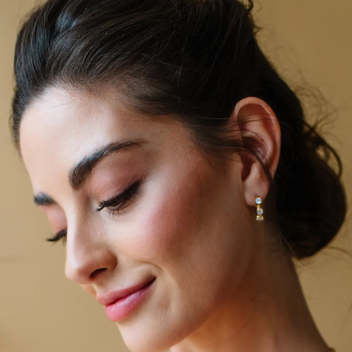 SCATTERED LOVE HUGGIE HOOPS - CUBIC ZIRCONIA & GOLD